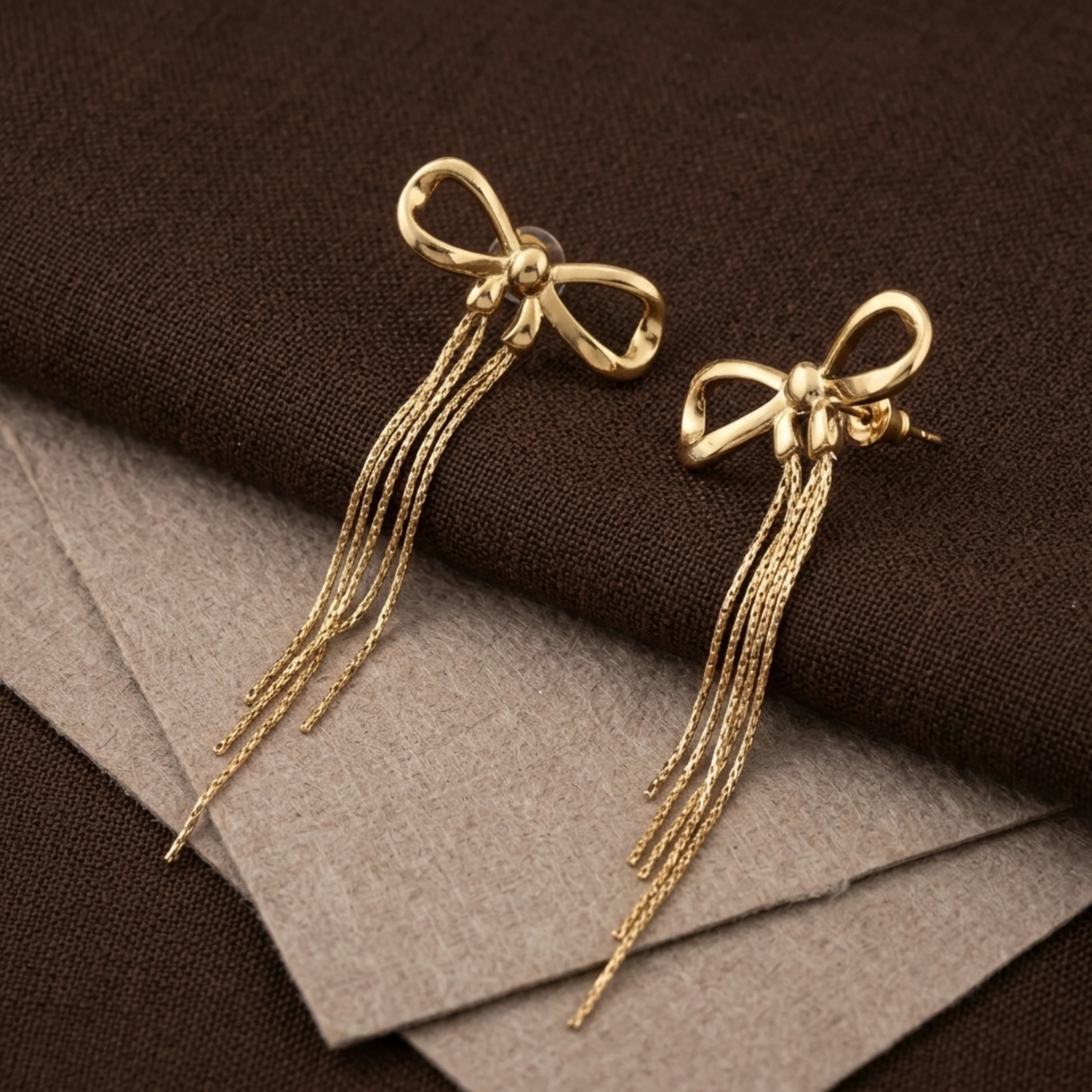 Ruvora Bow & Tassel Charm Earrings