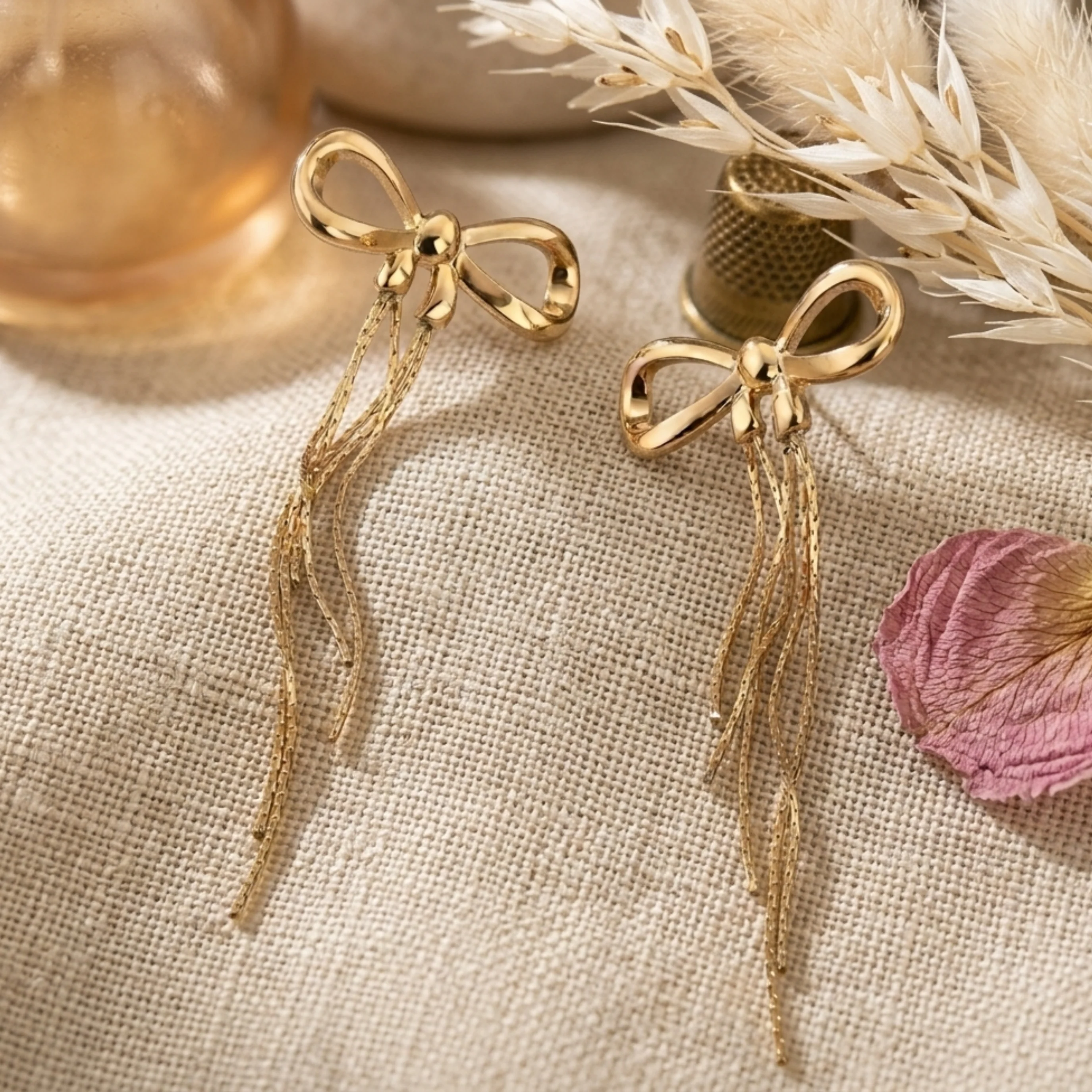 Ruvora Bow & Tassel Charm Earrings - Image 2