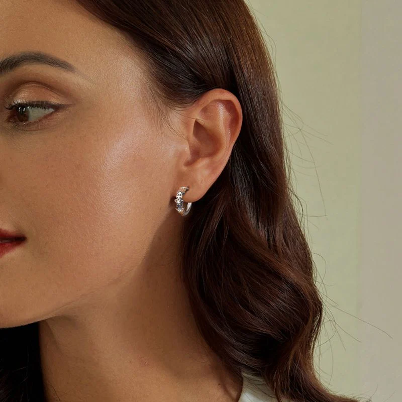 Stellar Shine Star Huggie Hoop Earrings - Image 2