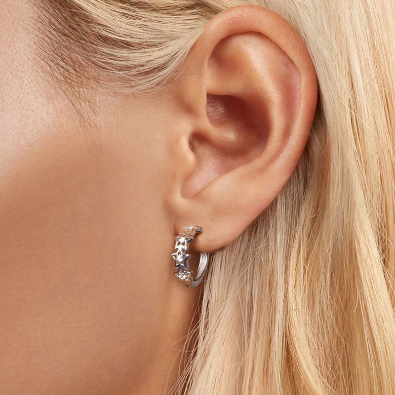Stellar Shine Star Huggie Hoop Earrings - Image 4